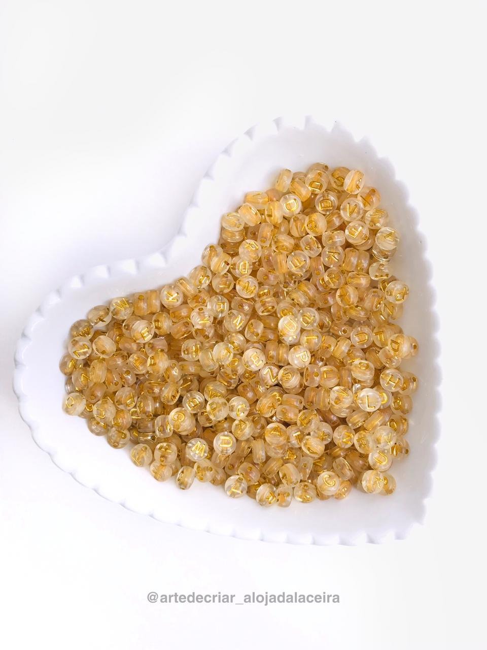 Entremeio de letra redonda transparente/dourado (20g)