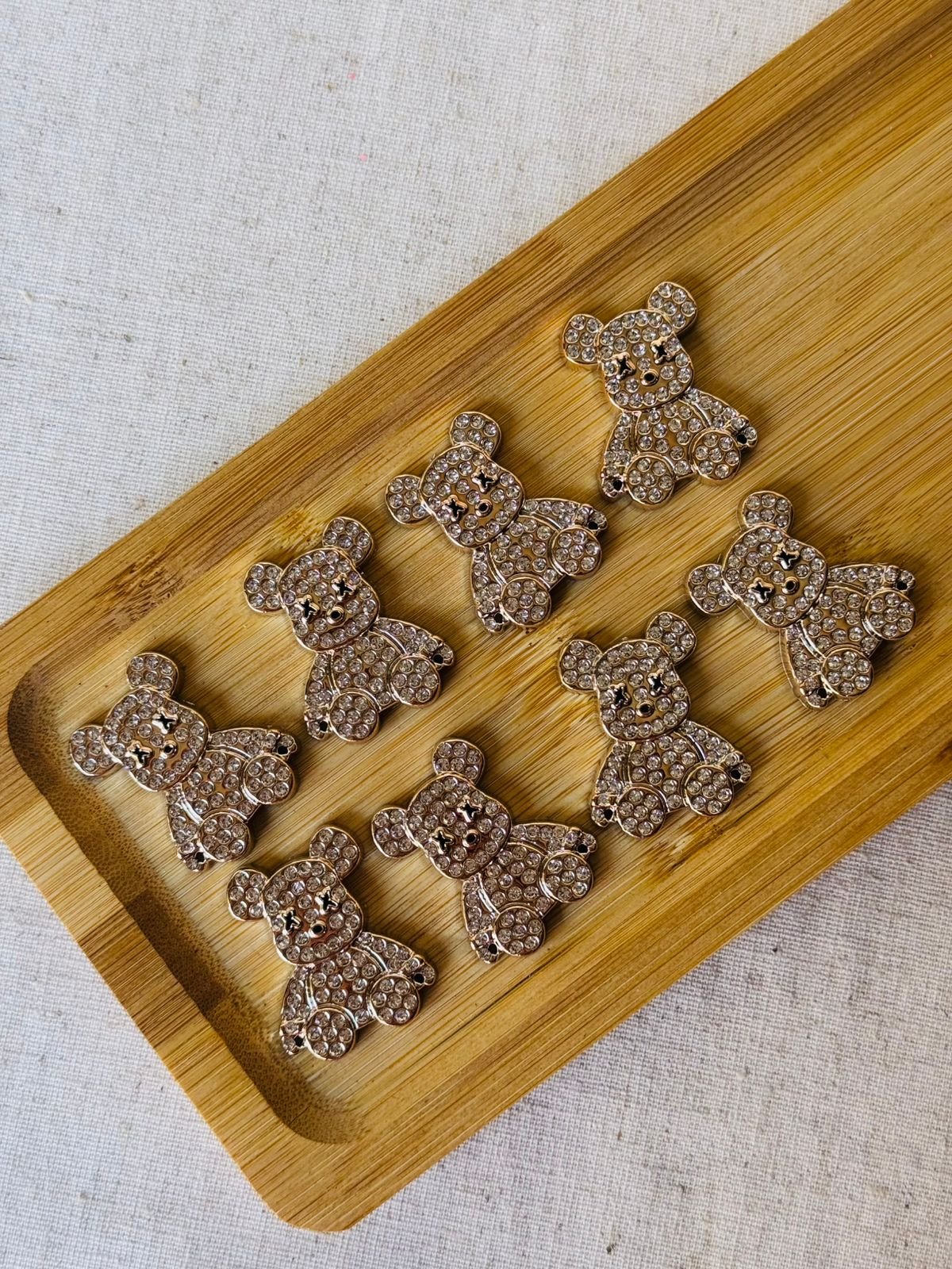 Chaton ABS urso dourado com strass