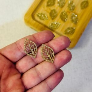Folhagem vazada de lonita dourada com gliter 2,5cm (5 und.) - Imagem 1